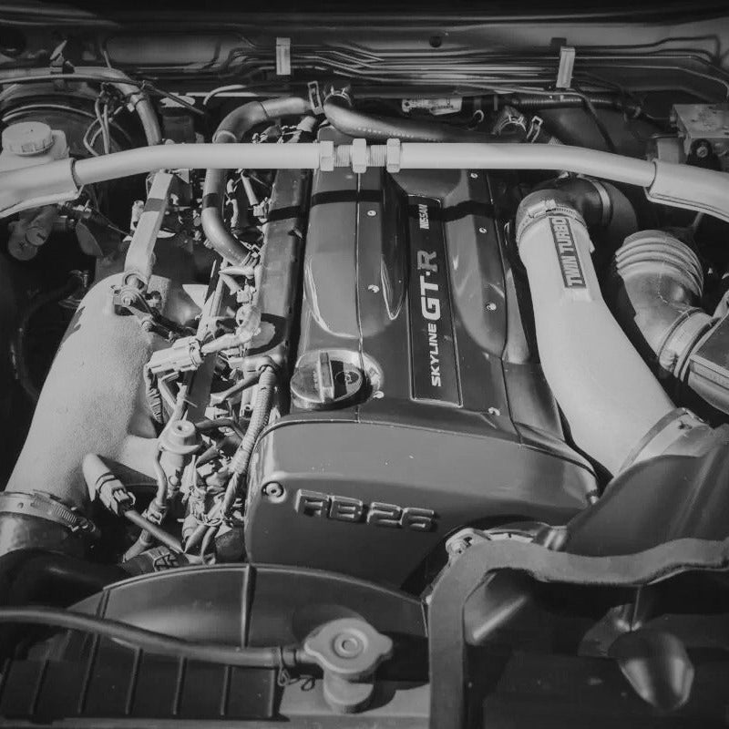black and white image of Nissan Skyline GT-R engine bay